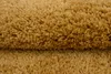 A close-up view of a fluffy, textured rug. Anteprima dell’immagine prodotto