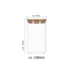 A clear shot of a glass storage jar with a bamboo lid, featuring measurement markings. Produktbild-Vorschau