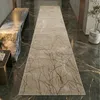 Tapis design avec motif abstrait brillant de nœuds beige Voir les images du produit 1
