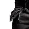 A close-up view of the zipper and pocket details of black denim shorts. Produktbild-Vorschau