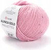 A ball of pink yarn with sequins, with a label attached. Produktbild-Vorschau