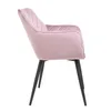 A side view of a pink velour chair with black legs against a white background. Produktbild-Vorschau