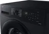 Close-up of the control panel and drum of a black Samsung washing machine. Produktbild-Vorschau