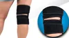 A person's leg wearing a black knee brace. Produktbild-Vorschau