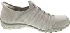A side view of a gray Skechers slip-on shoe. Náhled obrázku produktu