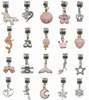 A collection of various charms for jewelry making, arranged in a grid. Produktbild-Vorschau