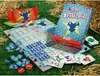 A board game laid out on grass and straw. Produktbild-Vorschau