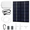 A collection of items for a solar-powered pond aerator, including the aerator unit, solar panel, tubing, air stones, and a carabiner clip. Produktbild-Vorschau