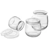 A group of empty glass jars with clear lids, arranged on a white background. Produktbild-Vorschau