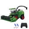 A green toy harvester truck with a remote control and two batteries shown separately. Náhled obrázku produktu