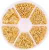 A circular plastic container with six compartments, each filled with gold-colored jump rings for jewelry making. Produktbild-Vorschau