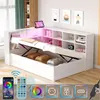 A white multifunctional daybed with storage and LED lighting, shown with the bed extended and storage compartments open. Produktbild-Vorschau