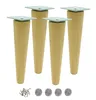 Four wooden furniture legs with silver mounting plates are displayed on a white background, along with screws and felt pads. Produktbild-Vorschau