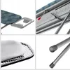 A collage of four close-up images showing different parts and details of an ironing board. Náhled obrázku produktu