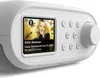 A close-up, angled view of a white digital radio with a screen displaying information about Edith Bowman. Voir les images du produit