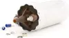 A white fuel pump with brown plastic components and some small metal and plastic accessories scattered around it on a white background. Produktbild-Vorschau
