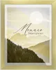A framed picture of mountains with text overlay. Produktbild-Vorschau