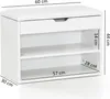 A white shoe bench with a padded seat and two open shelves, with dimensions indicated by measurement lines and text. Produktbild-Vorschau