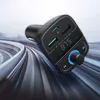 A black car FM transmitter with multiple USB ports and a digital display, set against a blurred background of a highway or racetrack. Anteprima dell’immagine prodotto