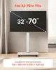 A TV stand with a TV mounted on it, shown in a room setting. Anteprima dell’immagine prodotto