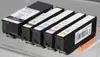 A set of four printer ink cartridges lined up diagonally. Produktbild-Vorschau