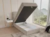 A bed with its storage compartment open, in a bedroom setting with a large window overlooking a natural landscape. Produktbild-Vorschau