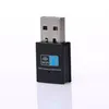A close-up studio shot of a black USB WiFi adapter against a white background. Produktbild-Vorschau