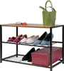 A three-tier shoe rack with various shoes and a green bag. Produktbild-Vorschau