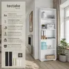 A white bookshelf is shown in a room with a fireplace and a window with curtains. The left side of the image contains marketing text and icons describing the product's features. Náhled obrázku produktu