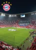 A football stadium with fans in the stands and a logo of FC Bayern München. Anteprima dell’immagine prodotto