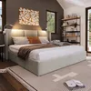 A bedroom scene featuring a bed with integrated lighting and a bookshelf in the background. Náhled obrázku produktu