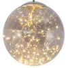 A close-up of a glass sphere filled with fairy lights. Produktbild-Vorschau