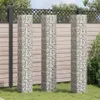 Three gabion planters are arranged in a garden setting against a wooden fence. Produktbild-Vorschau