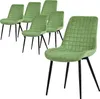 A set of six green dining chairs with black metal legs.