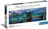 The image shows the packaging of a 1000-piece panorama puzzle featuring the Brooklyn Bridge and New York City skyline at dusk. Náhled obrázku produktu