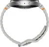 A side view of a smartwatch with a silver casing and a light gray, wavy band with orange accents. Náhled obrázku produktu