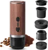 A portable electric espresso machine with a wood-grain finish, shown with coffee beans and grounds, and its disassembled parts laid out separately. Náhled obrázku produktu
