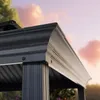A close-up view of the ornate roof and support column of a dark gray gazebo. Anteprima dell’immagine prodotto
