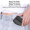 A person is putting a black charging case into their jeans pocket. Produktbild-Vorschau