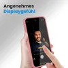 A hand holding a pink iPhone case, showing the phone screen with a selfie. Produktbild-Vorschau