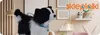 A plush dog toy is placed in a room with decorative items and a logo. Anteprima dell’immagine prodotto