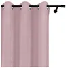 A close-up view of a pink curtain hanging on a curtain rod. Náhľad obrázku produktu
