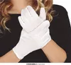 A person wearing white gloves. Anteprima dell’immagine prodotto