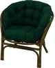 A green cushion on a rattan chair. Anteprima dell’immagine prodotto