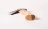 A small axe lying on a white surface. Produktbild-Vorschau