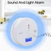 A white carbon monoxide detector is shown in the center of the image, with blue concentric circles radiating outwards. Musical notes are depicted on the right side, suggesting an audible alarm. Produktbild-Vorschau