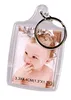 A clear acrylic keychain with a photo of a baby inside, attached to a silver keyring. Produktbild-Vorschau