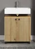 A bathroom vanity with a sink and faucet against a gray wall. Produktbild-Vorschau
