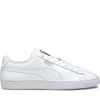 A studio shot of a single white Puma sneaker. Produktbild-Vorschau
