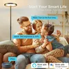 A family is sitting on a couch, interacting with a smart floor lamp. Produktbild-Vorschau